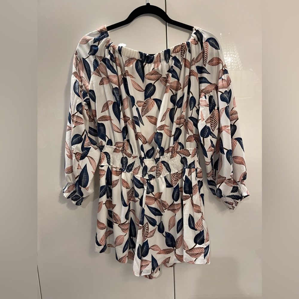 Bishop and Young partially open back romper